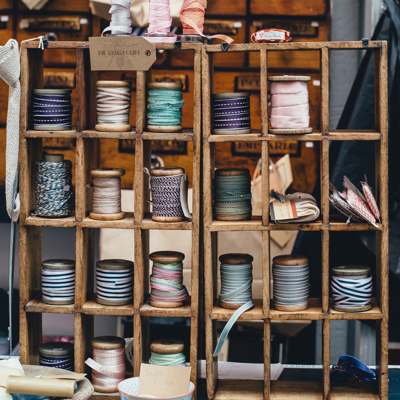 Spools of ribbon on a shelf